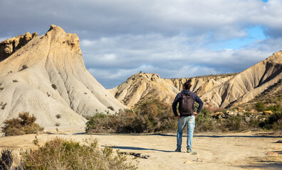Fototapeta na wymiar man walking in Tabernas desert- Spain, Andalusia