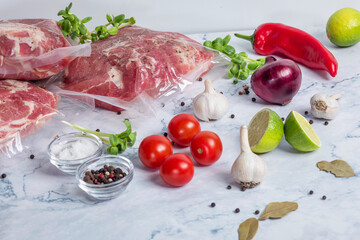 Meat packed in vacuum for cooking .