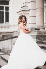 Fototapeta premium Beautiful luxury bride in elegant white dress