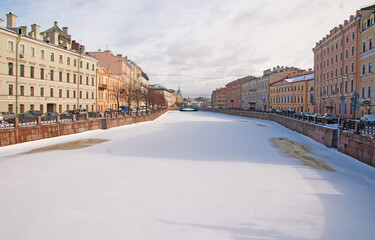Fototapeta na wymiar Moika river embankment and panorama of St. Petersburg 