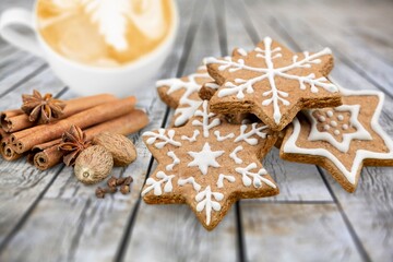 Cinnamon stars, traditional Christmas cookies, gingerbread on the desk