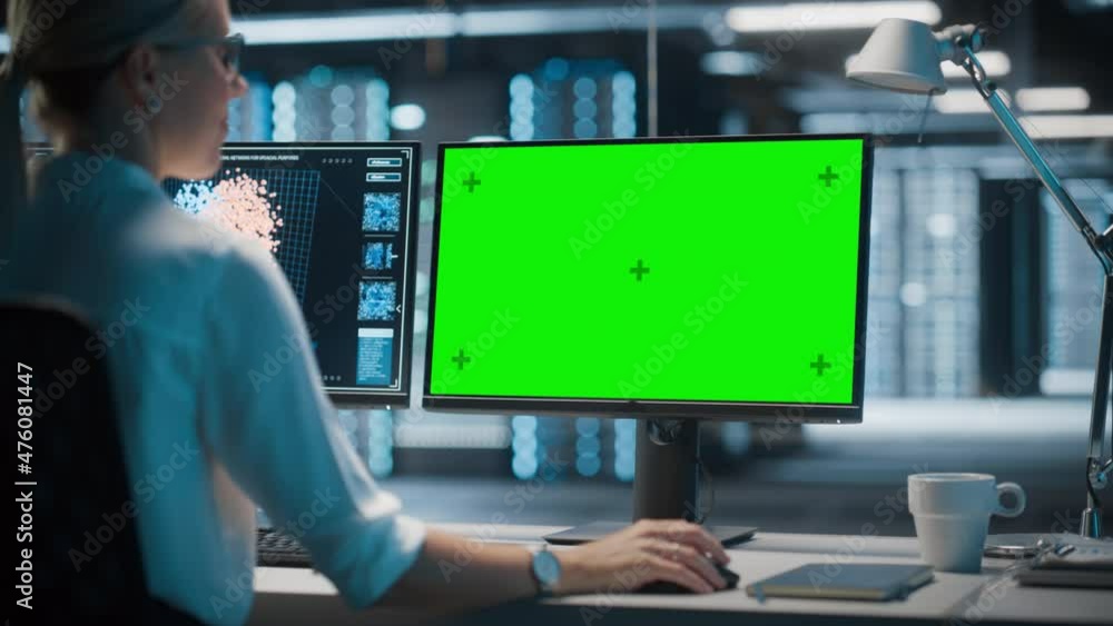 Poster High-Tech Data Center Server: Female IT Specialist Working on Green Screen Chroma Key Computer. Monitoring Web Services, Cloud Computing, Analytics Facility, Maintenance of Cyber Security