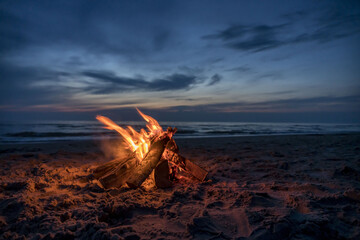 Campfire on the sandy beach at night. Tversted, Denmark.