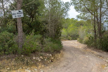 Fototapeta na wymiar Private hunting area sign written in Catalan