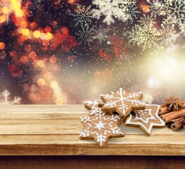 Cinnamon stars, traditional Christmas cookies, gingerbread on the desk