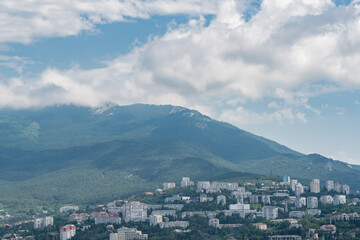 Fototapeta na wymiar Yalta, Crimea. Panorama of the city in sunny day. Top view 