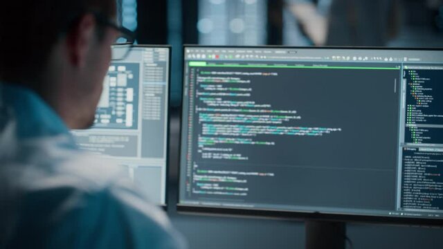 Data Center Server: IT Specialist Writing Software Code on Computer, on Screen Programming Language. Cyber Security Solution Expert. System Administrator. Data scientist. Infrastructure Architect.