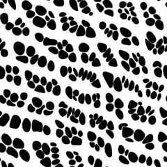 Natural shapes spotted vector pattern.
Black and white dotted stripes texture.