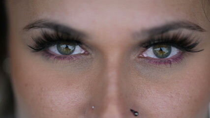 Obraz premium Woman eyes macro close-up closing eye in meditation. Person opening eyes looking at camera