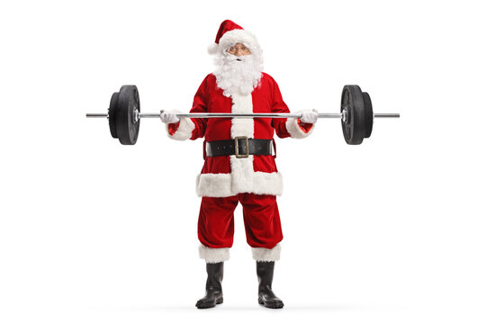 Full length portrait of santa claus lifting weights