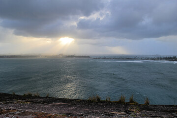 Stormy ocean with cloudy sky, view from Castillo San Felipe del Morro, Puerto Rico - obrazy, fototapety, plakaty