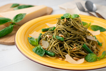 Pasta with pine nut pesto and green beans.