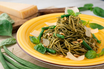Pasta with pine nut pesto and green beans.