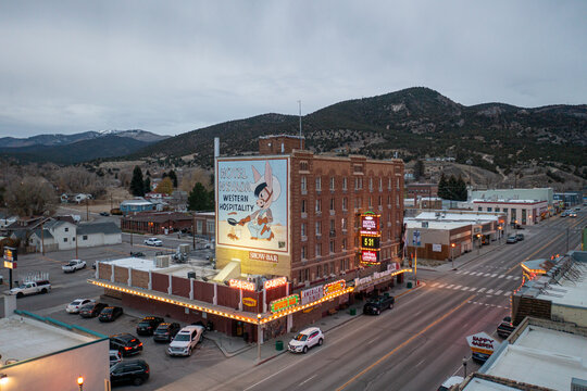 ELY, UNITED STATES - Dec 18, 2021: Hotel Nevada with lights on in west Ely, Nevada