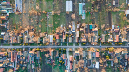 Top down aerial view of urban houses and streets in a residential area of a Serbian town