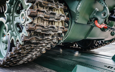 Steel army tank caterpillar tread tracks, closeup detail