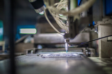 Closeup detail view of soft PVC dispensing machine head