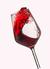 wine glasses with wine inside moving inside the glass