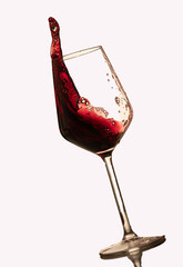 wine glasses with wine inside moving inside the glass