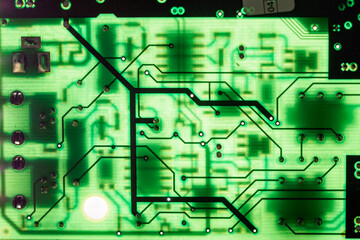 Backlit circuit board paths in detail.