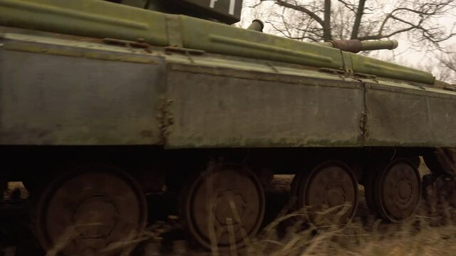 Military equipment.Military Tank In Movement On A Dirt Ground Terrain.Army military training.