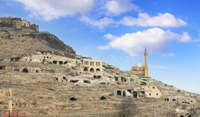 Fototapeta premium Nevsehir castle and Kayasehir underground rock city in Nevsehir, Turkey