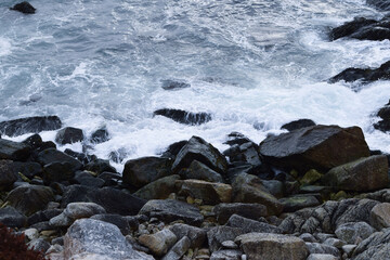 waves crashing on rocks