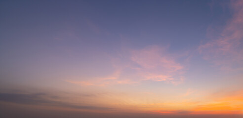 Sunset sky. Abstract nature background. Dramatic blue with orange colorful clouds in twilight time.