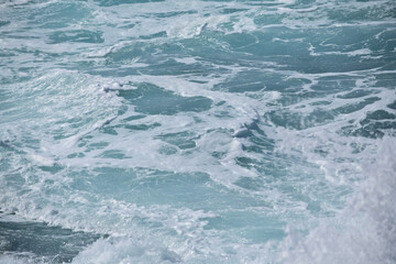 Naklejka na ściany i meble light blue wave with fresh ocean surf background