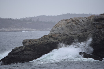 waves crashing on rocks