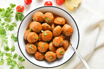 Meatballs with tomato sauce in bowl