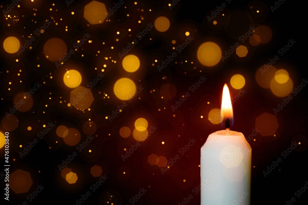 Canvas Prints Burning candles with festive bokeh on a black background. Holiday concept.