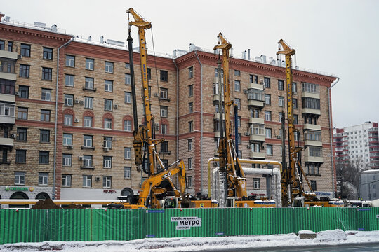 Moscow Russia - December 2021: Pile machines work in the city at the construction site of a subway line in Moscow.