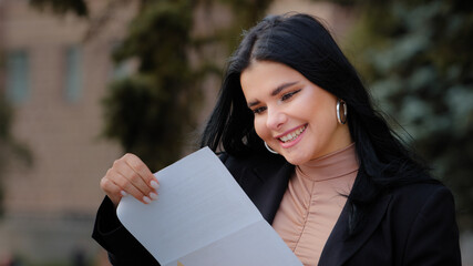 Portrait hispanic young woman read good news post mail happy smiling female got dream job career...