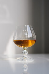 elegant brandy snifter glass in daylight