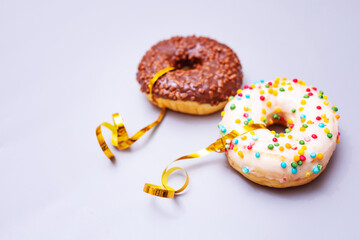 Donuts collection isolated on white background. Festive donut with golden ribbon for lovers