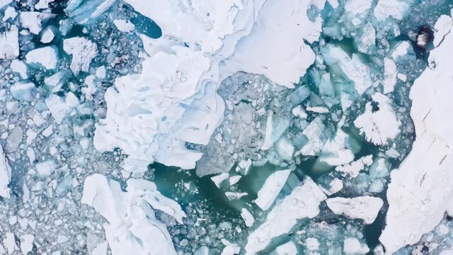 Icebergs from melting glacier in ice lagoon. Majestic Arctic Deep Clear Water. Climate Change Global Warming problem. Iceland.