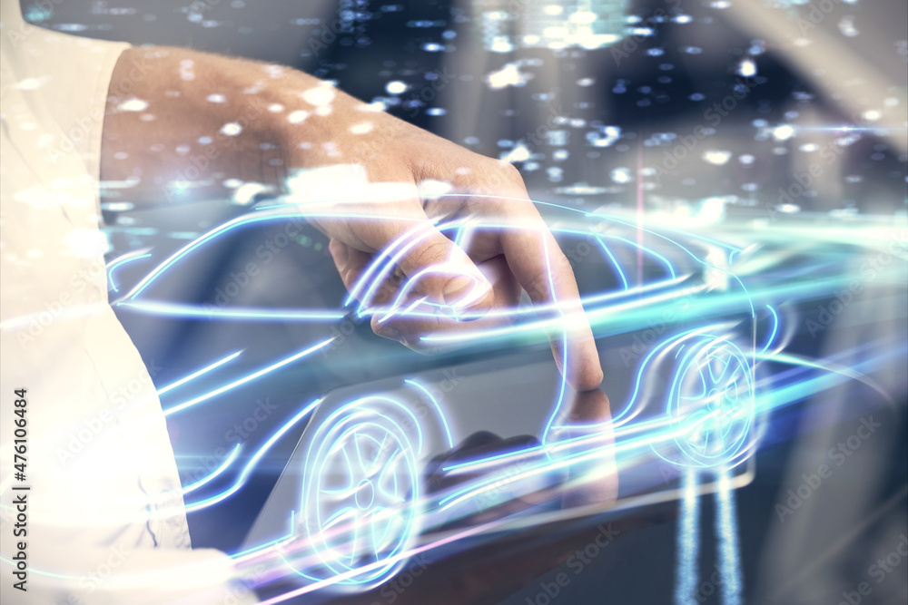 Aufkleber Double exposure of man's hands holding and using a digital device and automobile theme hologram drawing. Technology concept.