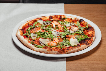 pizza with shrimp on the table 
