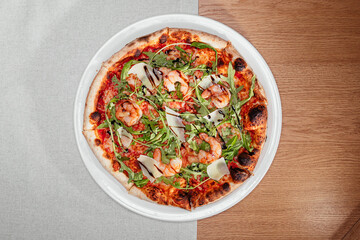 pizza with shrimp on the table