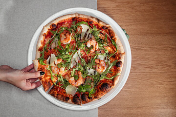 from pizza with shrimp take a piece