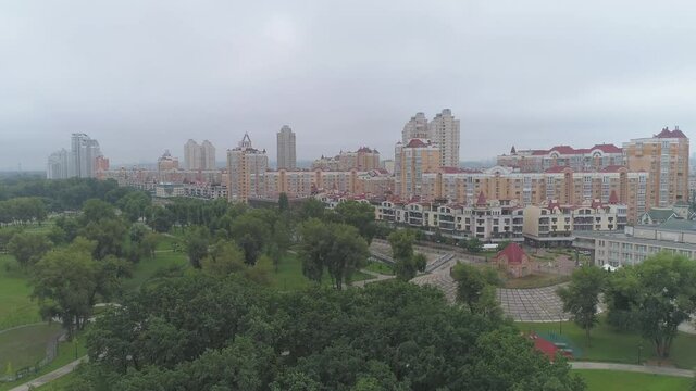 After rain. Cityscape in fog. Obolon district in Kyiv city, Ukraine. Aerial. 