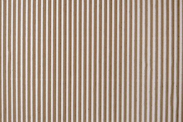 Obraz premium Texture of corrugated cardboard sheet in brown colour.