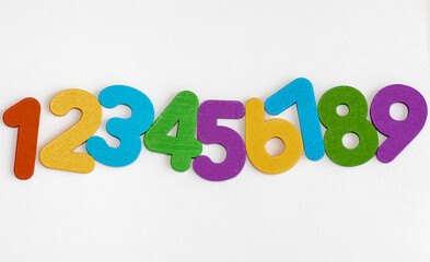 0, 1, 2, 3, 4, 5, 6, 7, 8, 9 numeral alphabet. digits from wooden material, colorful toys for kids....