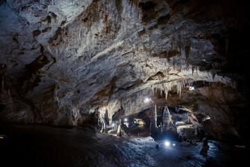 Giant stalagmite in a an underground cave