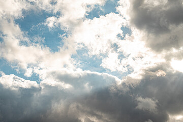 blue sky with many clouds.
very cloudy