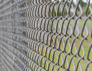 Perspective closeup of chain link fence