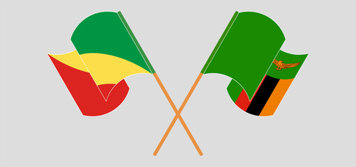 Crossed and waving flags of Republic of the Congo and Zambia