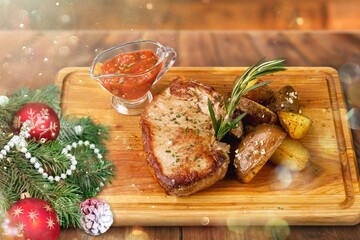 Christmas Meat dish with rosemary. The delicious festive dish for Christmas time.