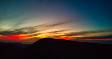 Dramatic panoramic image of the sunset over volcan Calderon Hondo volcano near Lajares Fuerteventura